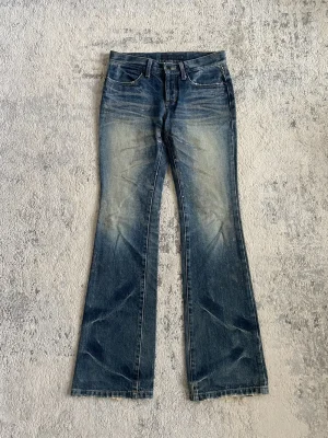 Fuga Coated Bootcut Jeans 30x33